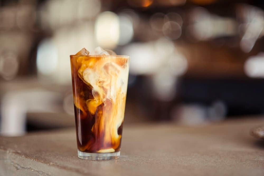 An iced coffee in a glass