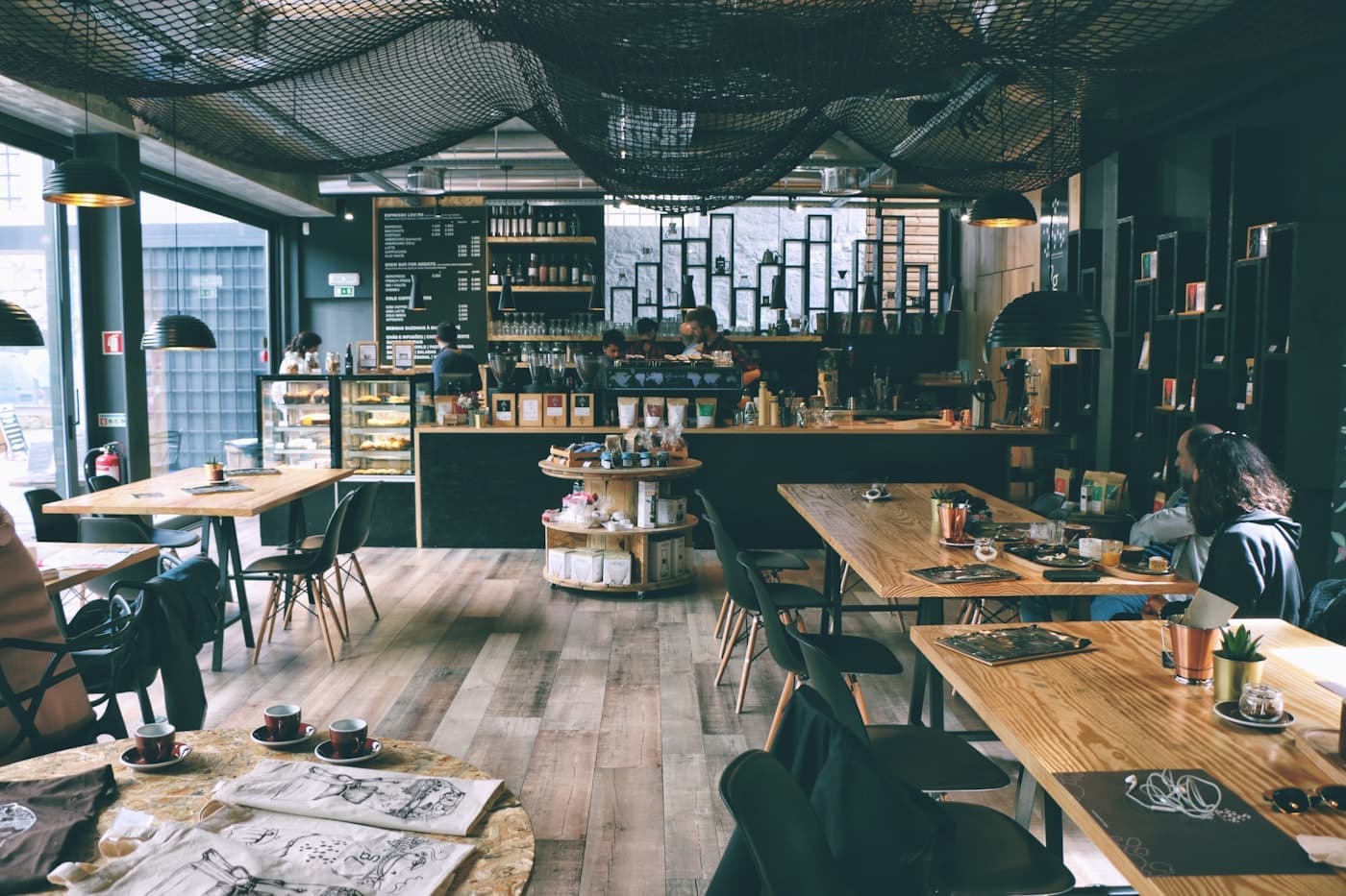 A warm, wood-filled coffee house interior
